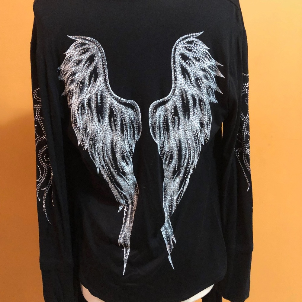 black cardigan with white angle wings